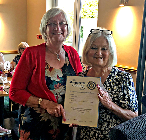 Linda Clayton (left) receiving the Margarette Golding Award from Linda Walker, President of the Inner Wheel Club of Cleer